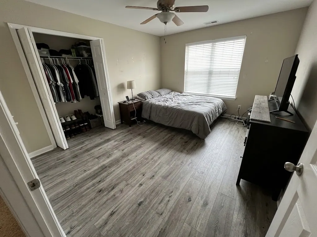 Laminate plank flooring with new trim in a Hampton Roads home