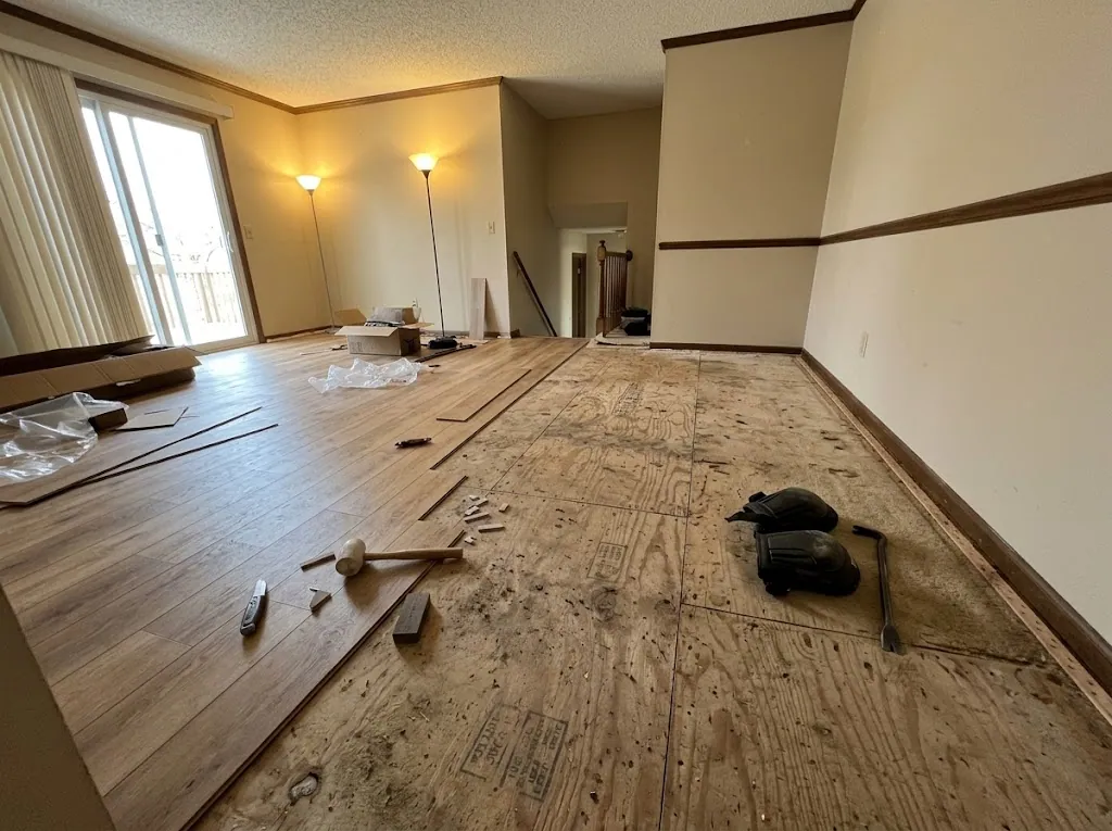 Luxury vinyl plank being installed over a plywood subfloor (LVP installation in Newport News, VA)