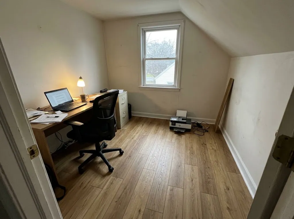 Honey oak luxury vinyl plank in a home office (LVP installation in Virginia Beach, VA)