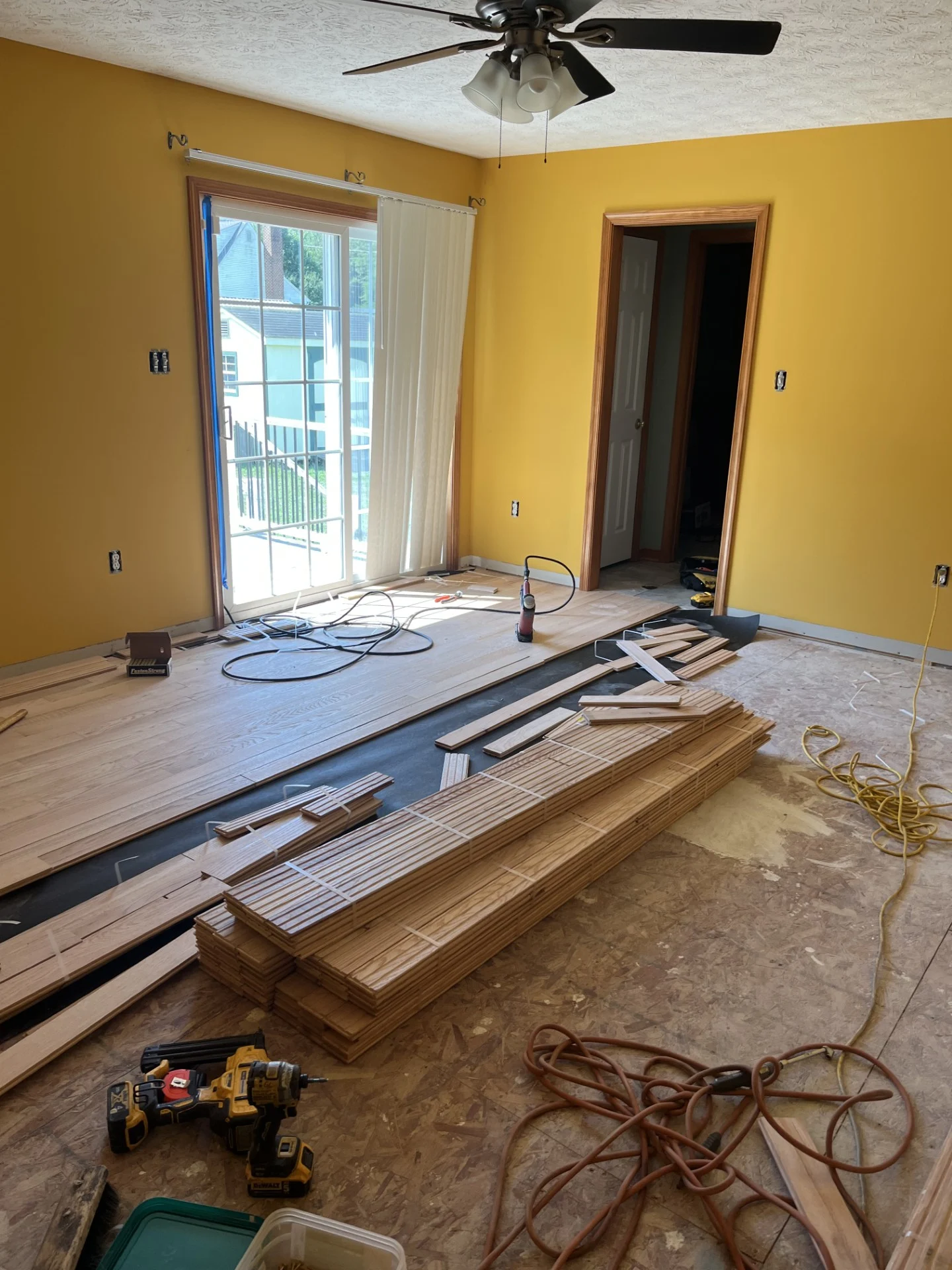 Subfloor and red oak planks staged before installation New Kent VA