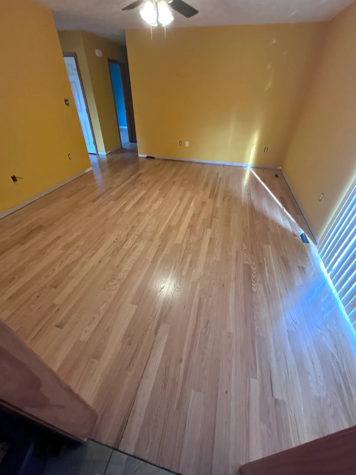 Red oak hardwood floor installed, sanded and finished in a New Kent home