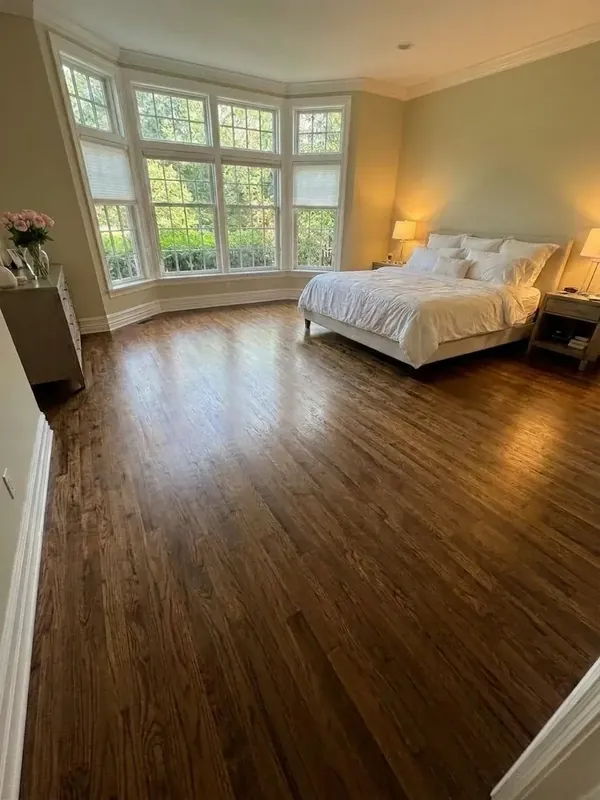 Refinished and stained oak floors in a Ford's Colony, Williamsburg bedroom