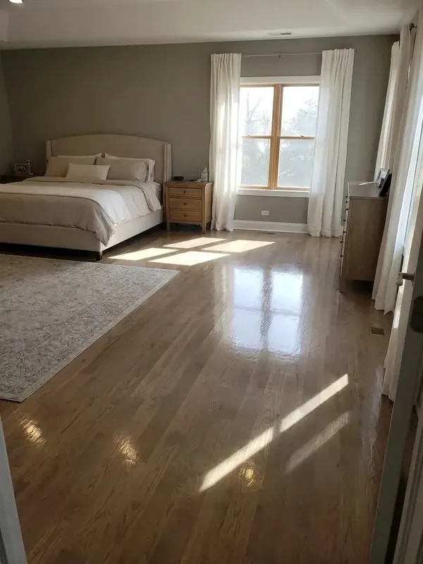 Solid white oak plank floor installed in a Grafton, Yorktown bedroom
